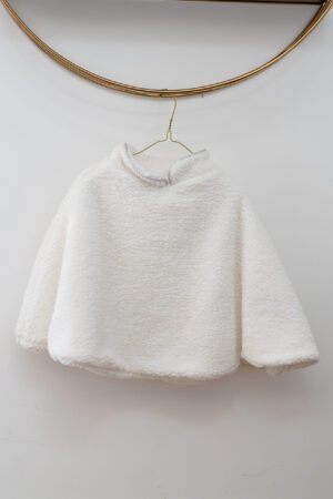 Poncho moumoute blanche liseré argenté