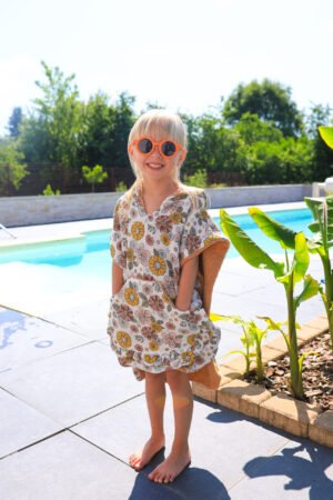 Poncho de bain grosses fleurs et froufrous