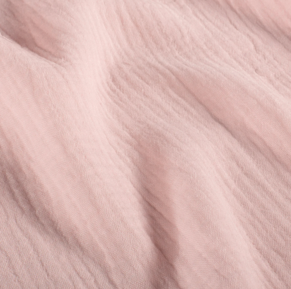 Tissu gaze de coton rose pâle