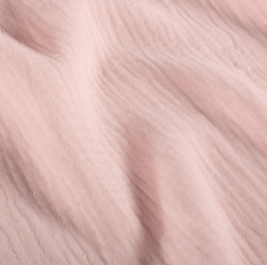 Tissu gaze de coton rose pâle