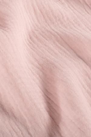 Tissu gaze de coton rose pâle
