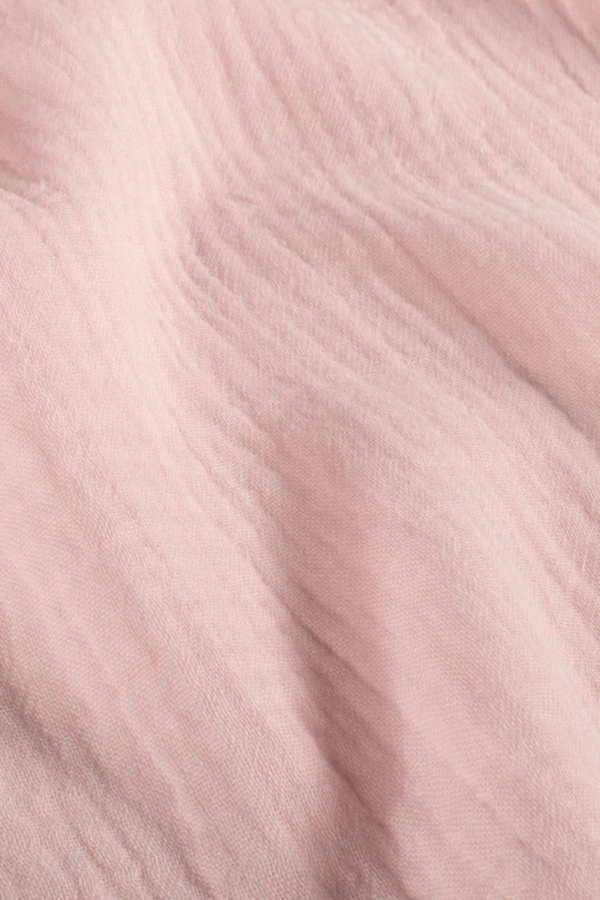 Tissu gaze de coton rose pâle
