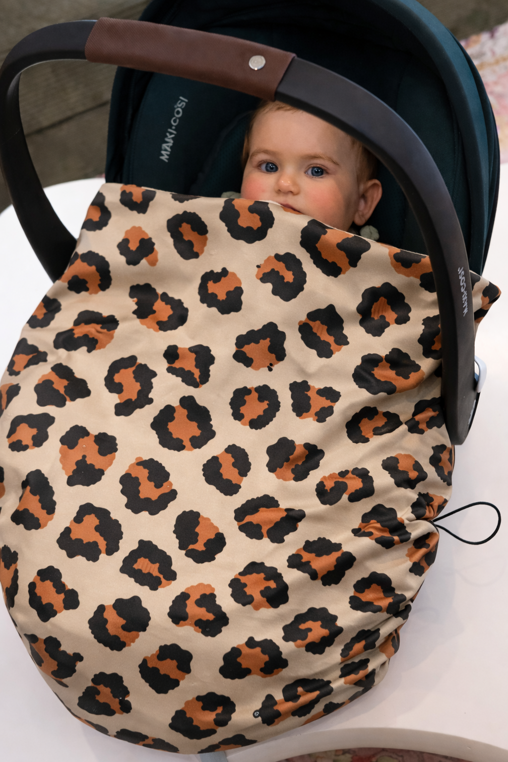 Couverture de cosy imperméable leopard