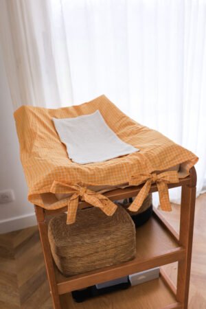 Housse matelas à langer quadriller