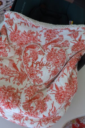 Couverture de cosy bird rouge